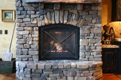 Ironhaus Door In Rock Surround With Feathers On Door - Custom Door 3